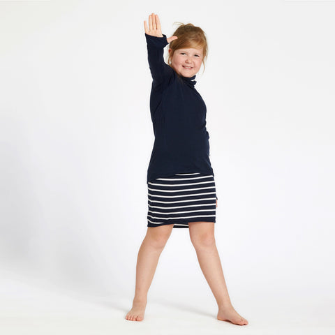 Girl wearing merino slouch skirt navy Breton stripes