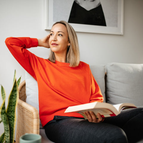 Relaxing in organic cotton merino women's top in tangerine orange