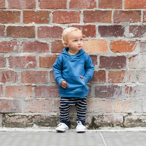 Child wearing cotton merino hoodie denim blue