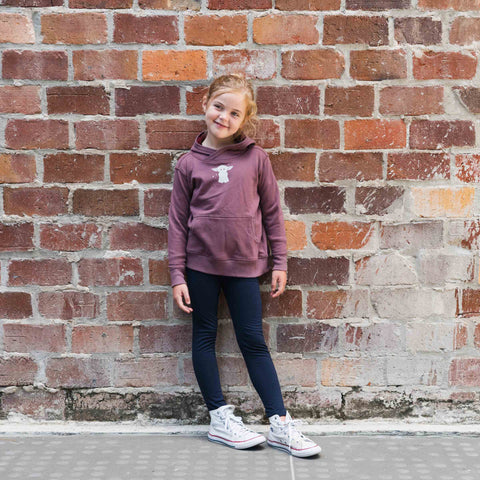 Child wearing organic cotton merino hoodie plum with print