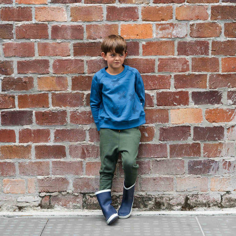 boy wearing cotton merino crew top in denim blue